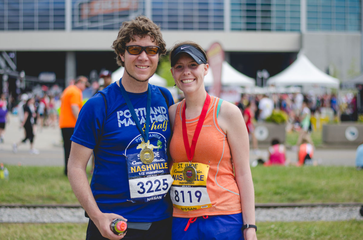 Young couple posing after completing a race
