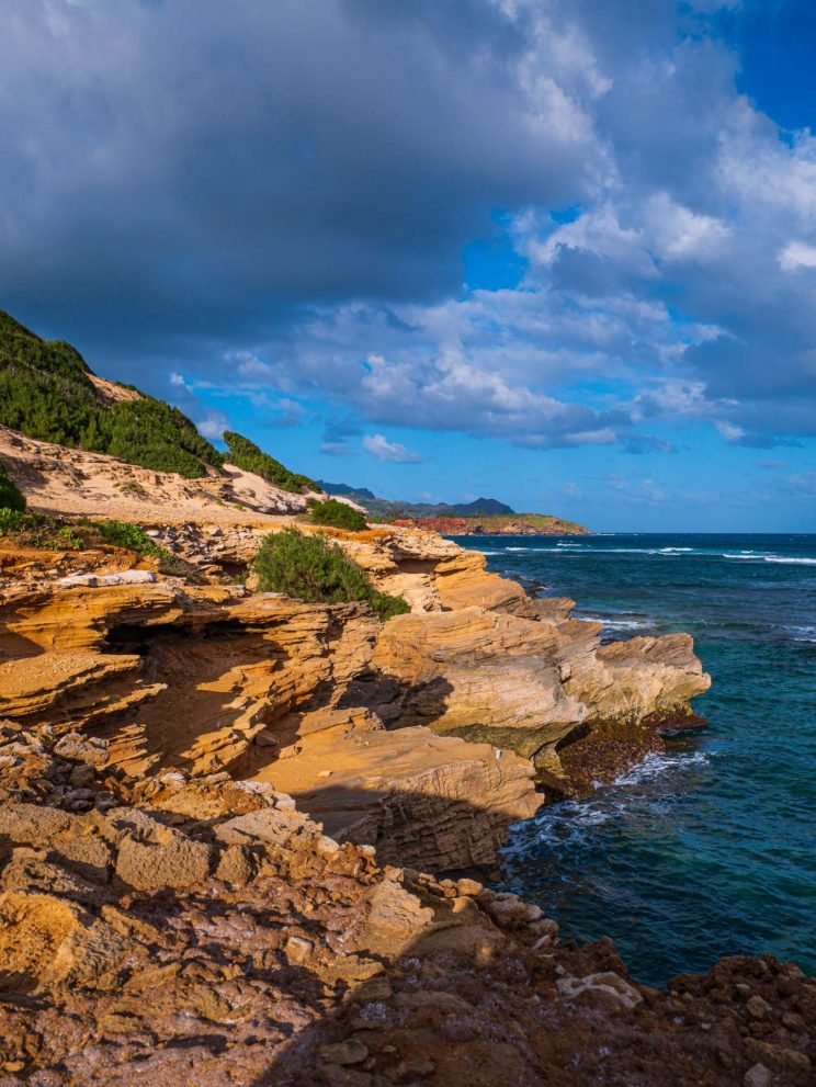 A view of rocky outcroppings in Kauai jut out into the Pacific Ocean